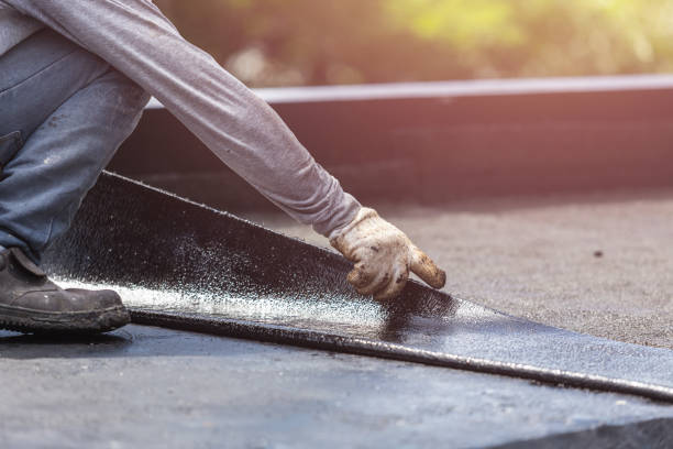 Professional Emergency Waterproofing technician working in Arlington, GA